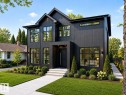 Modern black vertical siding exterior with prominent gabled roofline - 9243 148 Street, Edmonton, AB 