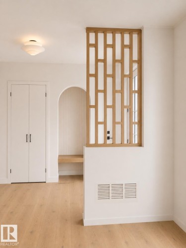 Decorative wood-slat partition wall separating living spaces - 9243 148 Street, Edmonton, AB 