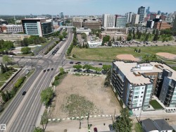 Expansive vacant lot situated within an urban environment - 