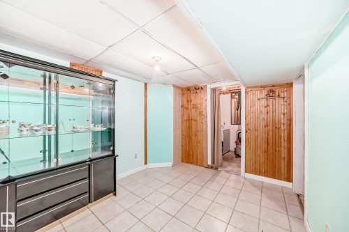 Room with light-colored tile flooring - 8 Campbell Court, Leduc, AB 