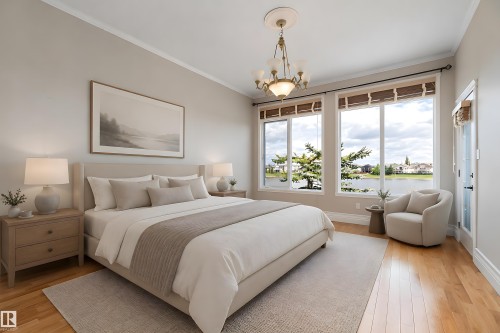 Bedroom featuring multiple large windows, wood-finish flooring, and a decorative chandelier - 16103 89 Street, Edmonton, AB - Indoor Photo Showing Bedroom