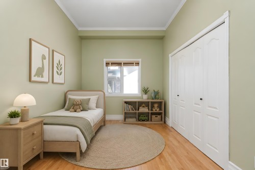 Pale green walls featuring white crown molding and baseboards - 16103 89 Street, Edmonton, AB - Indoor Photo Showing Bedroom