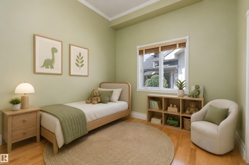 Room with light green walls and wood-finish flooring - 16103 89 Street, Edmonton, AB - Indoor Photo Showing Bedroom