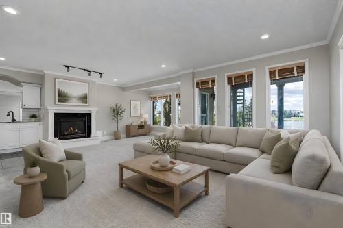 Spacious living area featuring a built-in fireplace with a white mantel, recessed lighting, and multiple large windows - 16103 89 Street, Edmonton, AB - Indoor Photo Showing Living Room With Fireplace