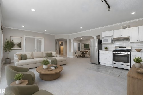 Open-concept living space with recessed lighting and crown molding - 16103 89 Street, Edmonton, AB - Indoor