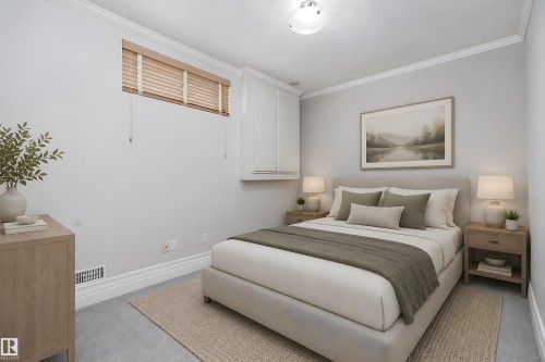 Neutral-toned bedroom featuring crown molding, baseboards, and light gray wall paint - 16103 89 Street, Edmonton, AB - Indoor Photo Showing Bedroom