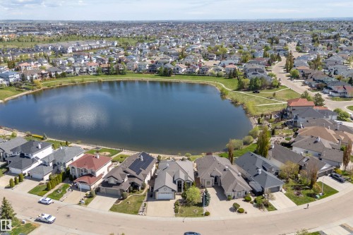 Expansive residential area featuring a central lake surrounded by green space - 16103 89 Street, Edmonton, AB - Outdoor With Body Of Water With View