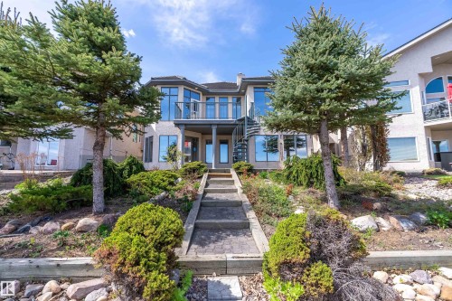 Stucco exterior with multiple balconies and large windows - 16103 89 Street, Edmonton, AB - Outdoor With Facade