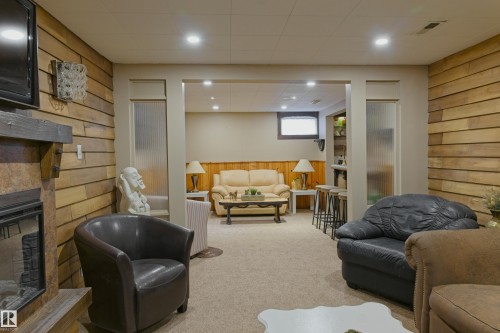 4615 54 Avenue, Barrhead, AB - Indoor Photo Showing Basement With Fireplace