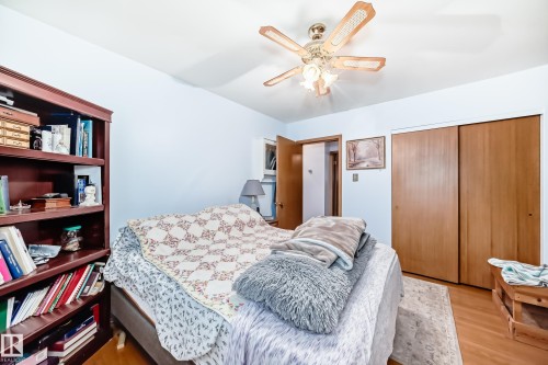 Light-toned wood-finish flooring complements the interior space - 8006 159 Street, Edmonton, AB 