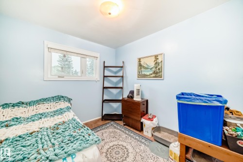 Light blue interior walls with a white-trimmed window - 8006 159 Street, Edmonton, AB 