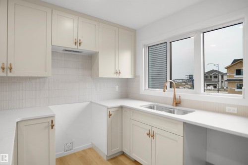 1312 9 Street Nw, Edmonton, AB - Indoor Photo Showing Kitchen With Double Sink