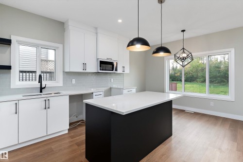 14 Southbridge Drive, Calmar, AB - Indoor Photo Showing Kitchen With Double Sink With Upgraded Kitchen