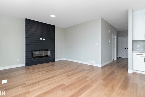 14 Southbridge Drive, Calmar, AB - Indoor Photo Showing Living Room With Fireplace