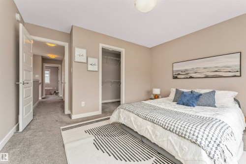 Carpeted room with a ceiling-mounted light fixture - 22124 85 Avenue, Edmonton, AB - Indoor Photo Showing Bedroom