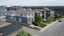 Contemporary two-story residence with a covered front porch and dormer window accents - 22124 85 Avenue, Edmonton, AB  - Outdoor With Facade 