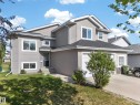 Modern two-story residence featuring light gray siding with white trim - 4113 59 Street, Beaumont, AB 