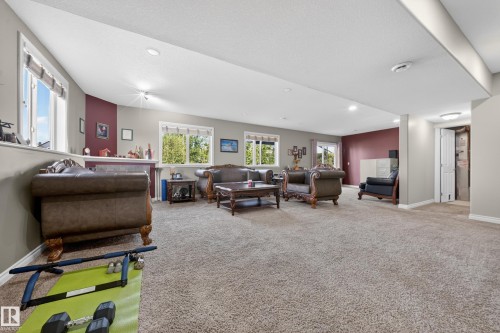Spacious lower-level area with ample natural light from multiple windows - 4113 59 Street, Beaumont, AB 