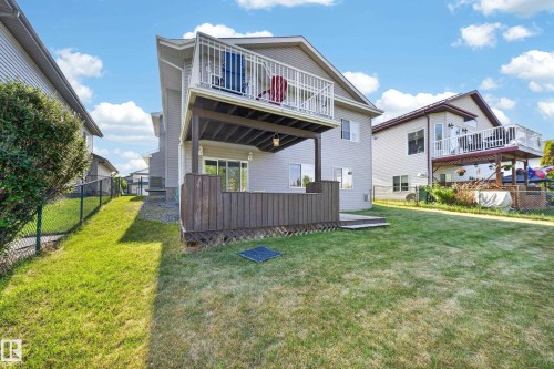 Rear exterior with dual-level outdoor spaces - 4113 59 Street, Beaumont, AB 