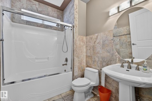 Residential dwelling with attached garage, situated on a curved street - 1508 Palmer Close, Edmonton, AB 