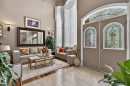Entry foyer featuring double doors with arched stained glass inserts and a transom window - 1508 Palmer Close, Edmonton, AB 