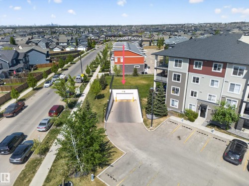 Residential building with multi-toned exterior siding and balconies - 225 1510 Watt Drive, Edmonton, AB - Outdoor With View