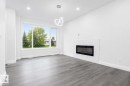 8731 154 Street, Edmonton, AB  - Indoor Photo Showing Living Room With Fireplace 