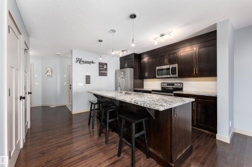 152 Radcliffe Wynd, Fort Saskatchewan, AB - Indoor Photo Showing Kitchen With Stainless Steel Kitchen With Upgraded Kitchen