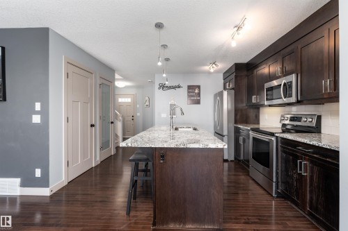 152 Radcliffe Wynd, Fort Saskatchewan, AB - Indoor Photo Showing Kitchen With Stainless Steel Kitchen With Upgraded Kitchen