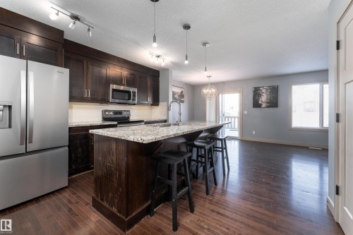 152 Radcliffe Wynd, Fort Saskatchewan, AB - Indoor Photo Showing Kitchen With Stainless Steel Kitchen With Upgraded Kitchen