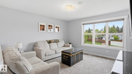 75 Rue Moreau, Beaumont, AB - Indoor Photo Showing Living Room