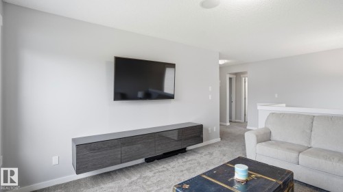 75 Rue Moreau, Beaumont, AB - Indoor Photo Showing Living Room