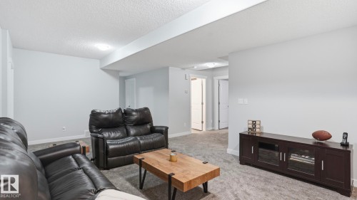 75 Rue Moreau, Beaumont, AB - Indoor Photo Showing Living Room