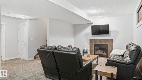 75 Rue Moreau, Beaumont, AB - Indoor With Fireplace