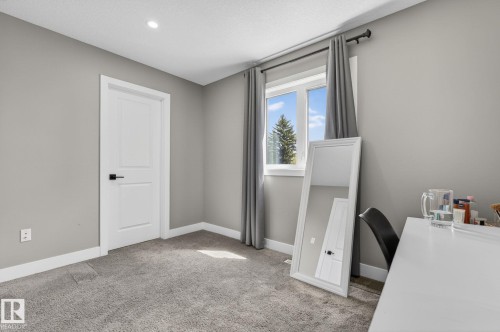 Neutral gray walls and plush gray carpeting - 8809 148 Street, Edmonton, AB - Indoor