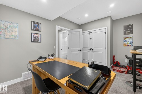 Gray wall paint, recessed lighting, and light gray carpeted flooring - 8809 148 Street, Edmonton, AB - Indoor