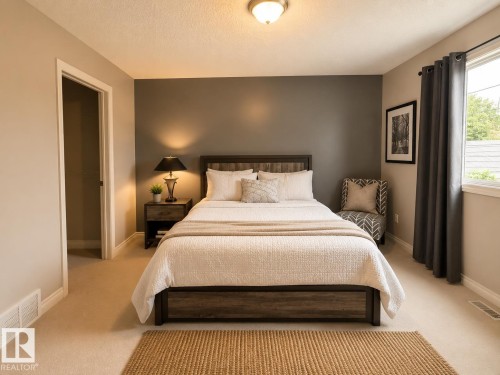 Carpeted room featuring a window with dark drapery, a flush-mount ceiling light, and a two-tone wall finish with a contrasting accent wall - 102 Hartwick Loop, Spruce Grove, AB 