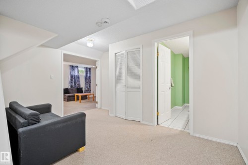 Carpeted interior area with white walls and ceiling - 15503 62 Street, Edmonton, AB 