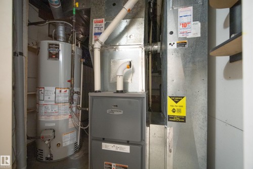 Hot water heater and furnace system in dedicated utility space - 15503 62 Street, Edmonton, AB 