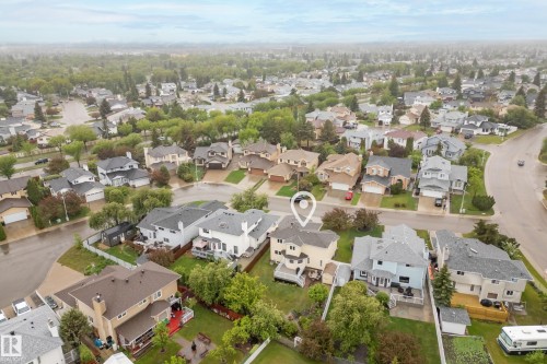 Residential street with established homes, mature trees, and paved roadways - 15503 62 Street, Edmonton, AB 
