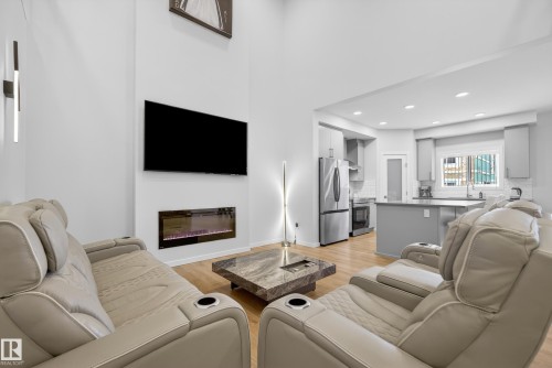 167 Catria Point(E), Sherwood Park, AB - Indoor Photo Showing Living Room With Fireplace