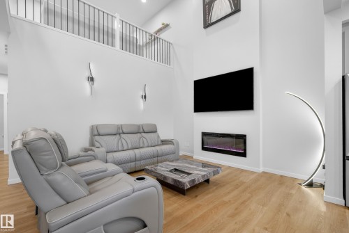 167 Catria Point(E), Sherwood Park, AB - Indoor Photo Showing Living Room With Fireplace