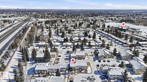 Aerial representation of a residential area with multiple townhome-style buildings, interspersed with detached homes - 20C Callingwood Court, Edmonton, AB - Outdoor With View