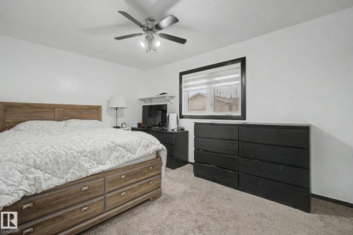 Neutral color palette with light gray carpet flooring - 242 Northmount Drive, Wetaskiwin, AB 