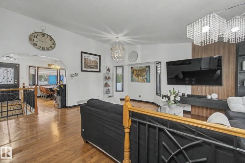 Hardwood flooring throughout the main living area - 242 Northmount Drive, Wetaskiwin, AB 