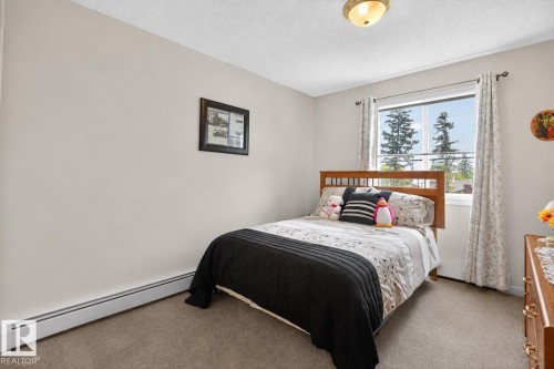203 5102 49 Avenue, Leduc, AB - Indoor Photo Showing Bedroom