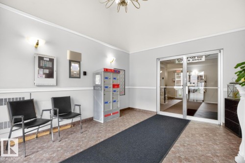 203 5102 49 Avenue, Leduc, AB - Indoor Photo Showing Other Room