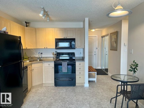 324 70 Woodsmere Close, Fort Saskatchewan, AB - Indoor Photo Showing Kitchen With Double Sink