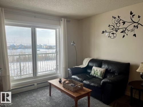324 70 Woodsmere Close, Fort Saskatchewan, AB - Indoor Photo Showing Living Room