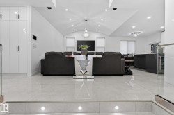 Polished tile flooring with integrated step lighting - 